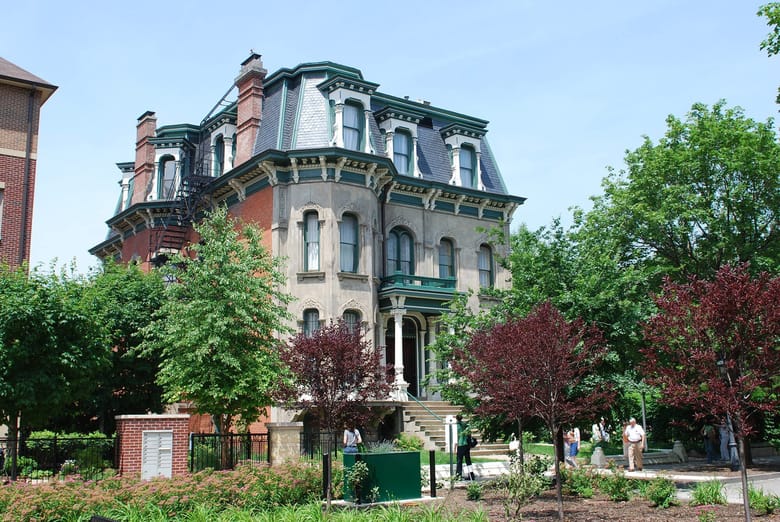 Exterior view of the Keith Mansion, a grand Victorian-era building with intricate architectural details.