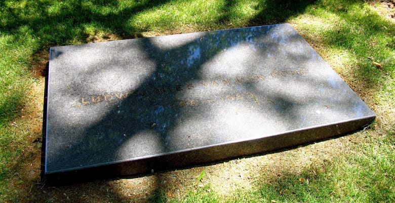 Flat memorial plaque on green grass