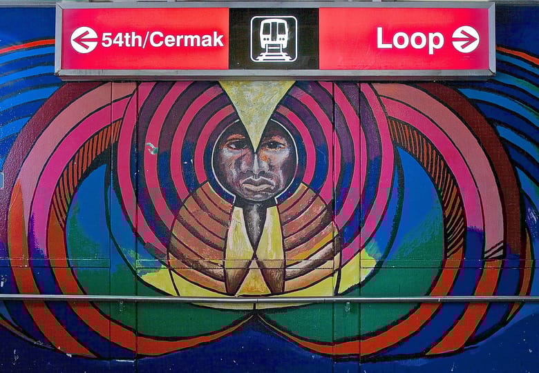 Vibrant mural with face at center 