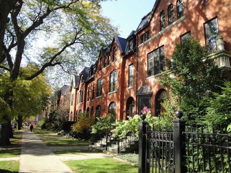 Historic Sheffield streets lined with late 19th-century architecture and landmarked Row House Districts.