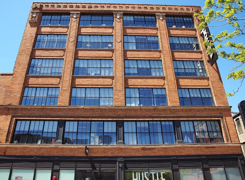 A photo of WeWork offices Fulton Market as seen from street level.