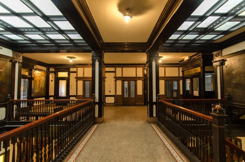 Interior of building with dark wood trim