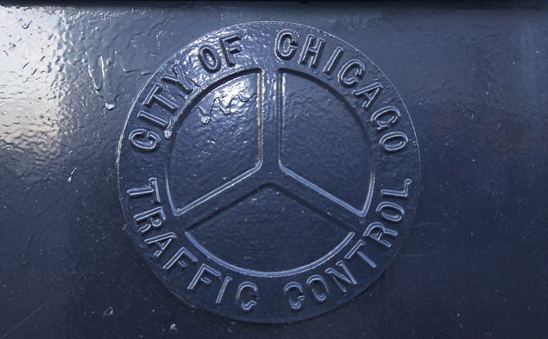 Photo: Chicago’s Municipal Device on Division Street Between the Bridges; Photographer: Victor Grigas via Wikimedia Commons
