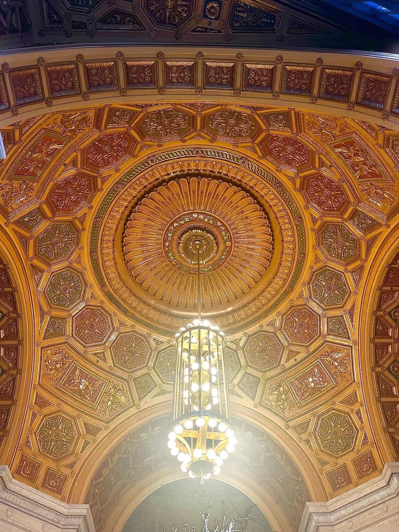 Mosaic tile domed ceiling in gold and copper tones