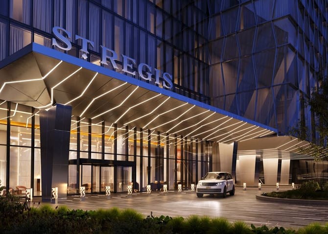 Exterior or a modern hotel, St Regis, with wavy white and blue lights